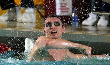23 Mar 2002:  Chris Thompson of Club Wolverine celebrates his win in the Men's 1500M Freestyle after running down Fran Crippen on the last lap of the race in the finals of the during the Phillips 66 U.S. National Swimming Championships at the University A