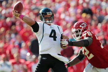 KANSAS CITY, MO - OCTOBER 24:  Quarterback Todd Bouman #4 of the Jacksonville Jaguars passes as Glenn Dorsey #72 of the Kansas City Chiefs defends during the game on October 24, 2010 at Arrowhead Stadium in Kansas City, Missouri.  (Photo by Jamie Squire/G