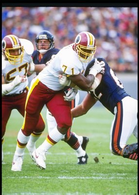 6 Oct 1991:  Defensive lineman Charles Mann of the Washington Redskins works against a Chicago Bears player during a game at Soldier Field in Chicago, Illinois.  The Redskins won the game, 20-7. Mandatory Credit: Jonathan Daniel  /Allsport