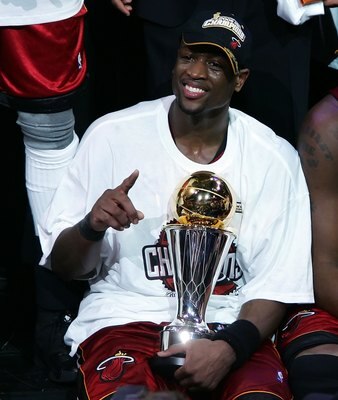 DALLAS - JUNE 20:  (L-R) Dwyane Wade #3 and Shaquille O'Neal #32 of the Miami Heat celebrate after the Heat won the 2006 NBA Finals after defeating the Dallas Mavericks 95-92 on June 20, 2006 at American Airlines Center in Dallas, Texas.  NOTE TO USER: Us