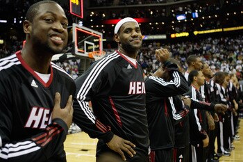 KANSAS CITY, MO - OCTOBER 08:  LeBron James #6 and Dwayne Wade #3 of the Miami Heat joke prior to the start of the game against the Oklahoma City Thunder on October 8, 2010 at the Sprint Center in Kansas City, Missouri.  (Photo by Jamie Squire/Getty Image