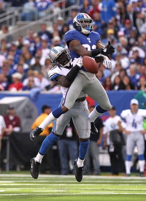 EAST RUTHERFORD, NJ - OCTOBER 17:  Mario Manningham #82 of the New York Giants has his reception broken up by C.C. Brown #39 of the Detroit Lions at New Meadowlands Stadium on October 17, 2010 in East Rutherford, New Jersey.  (Photo by Nick Laham/Getty Im