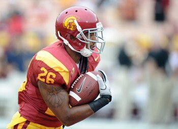 LOS ANGELES, CA - OCTOBER 16:  Marc Tyler #26 of the USC Trojans warms up before the game against the California Golden Bears at Los Angeles Memorial Coliseum on October 16, 2010 in Los Angeles, California.  (Photo by Harry How/Getty Images)