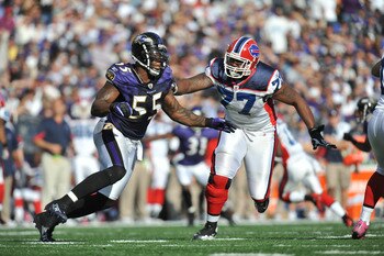 BALTIMORE, MD - OCTOBER 24:  Terrell Suggs #55 of the Baltimore Ravens defends against Demetrius Bell #77 of the Buffalo Bills at M&T Bank Stadium on October 24, 2010 in Baltimore, Maryland. The Ravens defeated the Bills 37-34. (Photo by Larry French/Gett