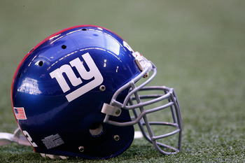 IRVING, TX - JANUARY 13:  A New York Giants helmet sits on the field before the NFC Divisional Playoff game against the Dallas Cowboys at Texas Stadium on January 13, 2008 in Irving, Texas.  (Photo by Chris Graythen/Getty Images)