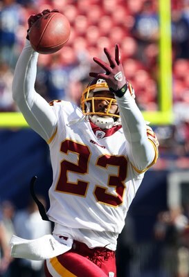 EAST RUTHERFORD, NJ - SEPTEMBER 13:  DeAngelo Hall #23 of the Washington Redskins warms up before playing the New York Giants on September 13, 2009 at Giants Stadium in East Rutherford, New Jersey.  (Photo by Jim McIsaac/Getty Images)