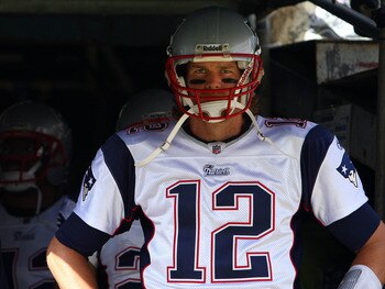 SAN DIEGO - OCTOBER 24:  Quarterback Tom Brady #12 of the New England prepares to enter the game against the San Diego Chargers during their NFL game on October 24, 2010 at Qualcomm Stadium in San Diego, California. (Photo by Donald Miralle/Getty Images)