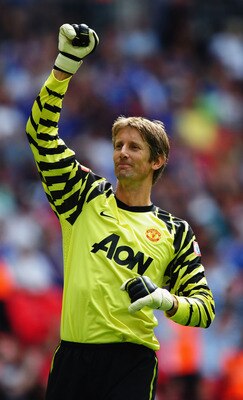 LONDON, ENGLAND - AUGUST 08:  Edwin Van der Sar of Manchester United celebrates the opening goal by Antonio Valencia during the FA Community Shield match between Chelsea and Manchester United at Wembley Stadium on August 8, 2010 in London, England.  (Phot