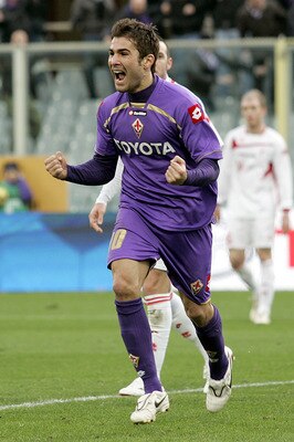 FLORENCE, ITALY - JANUARY 10:  Adrian Mutu of ACF Fiorentina celebrates after scoring a goal during the Serie A match between Fiorentina and Bari at Stadio Artemio Franchi on January 10, 2010 in Florence, Italy.  (Photo by Gabriele Maltinti/Getty Images)