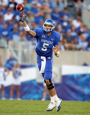 LEXINGTON, KY - SEPTEMBER 18:  Mike Hartline #5 of the Kentucky Wildcats throws a pass during the game against the Akron Zips at Commonwealth Stadium on September 18, 2010 in Lexington, Kentucky.  (Photo by Andy Lyons/Getty Images)