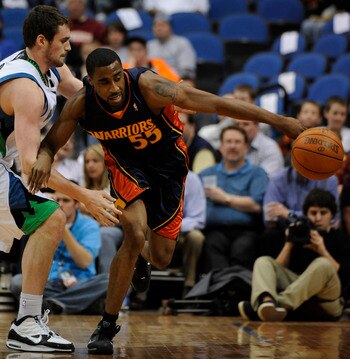 MINNEAPOLIS, MN - APRIL 7: Reggie Williams #55 of the Golden State Warriors chases a loose ball in the second first against Kevin Love #42 of the Minnesota Timberwolves during a basketball game at Target Center on April 7, 2010 in Minneapolis, Minnesota.