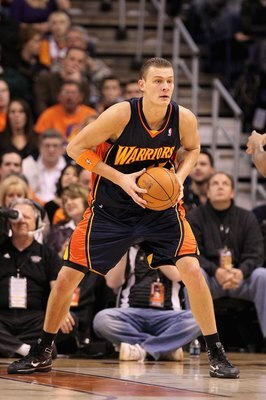 PHOENIX - JANUARY 23:  Andris Biedrins #15 of the Golden State Warriors during the NBA game against the Phoenix Suns at US Airways Center on January 23, 2010 in Phoenix, Arizona. The Suns defeated the Warriors 112-103.  NOTE TO USER: User expressly acknow