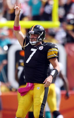 MIAMI - OCTOBER 24:  Quarterback Ben Roethlisberger #7 celebrates a touchdown against the Miami Dolphins at Sun Life Stadium on October 24, 2010 in Miami, Florida.  (Photo by Marc Serota/Getty Images)