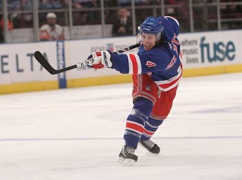 NEW YORK - MARCH 24:  Michael del Zotto #4 of the New York Rangers against the New York Islanders at Madison Square Garden on March 24, 2010 in New York City.  (Photo by Nick Laham/Getty Images)