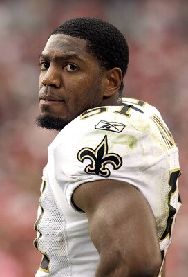 GLENDALE, AZ - OCTOBER 10:  Linebacker Jonathan Vilma #51 of the New Orleans Saints stands on the sidelines during the NFL game against the Arizona Cardinals at the University of Phoenix Stadium on October 10, 2010 in Glendale, Arizona. The Cardinals defe