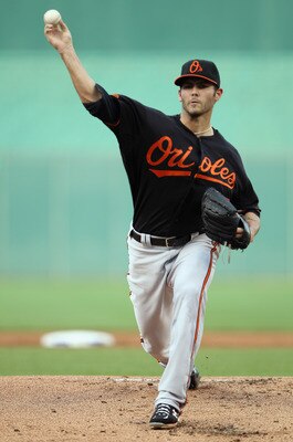 KANSAS CITY, MO - JULY 30:  Starting pitcher Jake Arrieta #57 of the Baltimore Orioles warms-up just prior to the start of the game against the Kansas City Royals on July 30, 2010 at Kauffman Stadium in Kansas City, Missouri.  (Photo by Jamie Squire/Getty