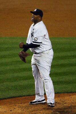 NEW YORK - OCTOBER 20:  CC Sabathia #52 of the New York Yankees reacts after he struck out Mitch Moreland #18 of the Texas Rangers to end the top of the sixth inning of Game Five of the ALCS during the 2010 MLB Playoffs at Yankee Stadium on October 20, 20