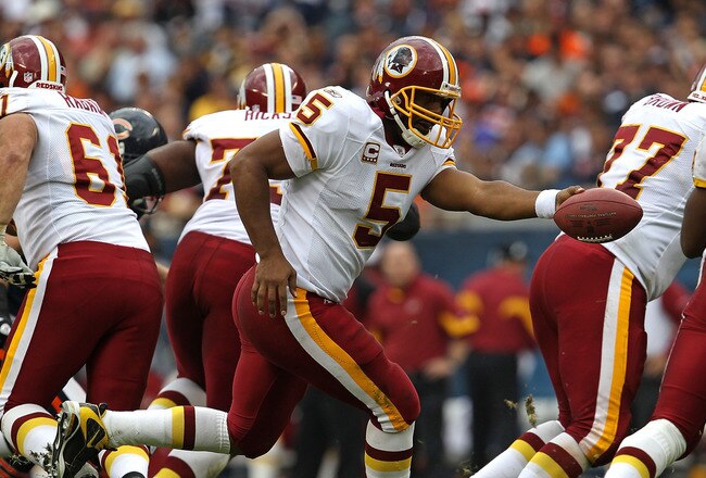 CHICAGO - OCTOBER 24: Donovan McNabb #5 of the Washington Redskins turns to hand off against the Chicago Bears at Soldier Field on October 24, 2010 in Chicago, Illinois. The Redskins defeated the Bears 17-14. (Photo by Jonathan Daniel/Getty Images)