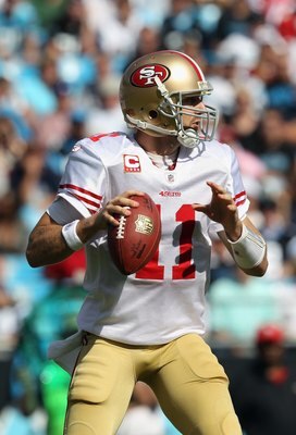 CHARLOTTE, NC - OCTOBER 24:  Alex Smith #11 of the San Francisco 49ers against the Carolina Panthers during their game at Bank of America Stadium on October 24, 2010 in Charlotte, North Carolina.  (Photo by Streeter Lecka/Getty Images)