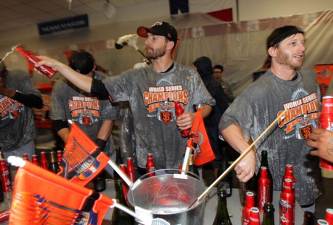 ARLINGTON, TX - NOVEMBER 01:  Madison Bumgarner #40 of the San Francisco Giants celebrate in the locker room after the Giants won 3-1 against the Texas Rangers in Game Five of the 2010 MLB World Series at Rangers Ballpark in Arlington on November 1, 2010 