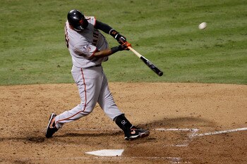 ARLINGTON, TX - NOVEMBER 01:  Edgar Renteria #16 of the San Francisco Giants hits a 3-run home run in the seventh inning against Cliff Lee #33 of the Texas Rangers in Game Five of the 2010 MLB World Series at Rangers Ballpark in Arlington on November 1, 2