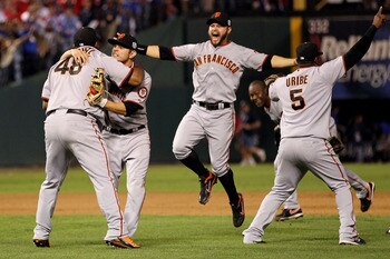 ARLINGTON, TX - NOVEMBER 01:  (L-R) Pablo Sandoval #48, Freddy Sanchez #21, Cody Ross #13, Edgar Renteria #16 and Juan Uribe #5 of the San Francisco Giants celebrate after they won 3-1 against the Texas Rangers in Game Five of the 2010 MLB World Series at