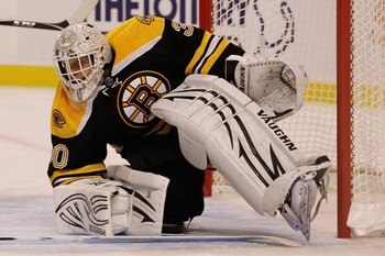 BOSTON - OCTOBER 21:  Tim Thomas #30 of the Boston Bruins skates against the Washington Capitals at the TD Garden on October 21, 2010 in Boston, Massachusetts.  The Bruins won 4-1.  (Photo by Bruce Bennett/Getty Images)