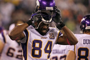 EAST RUTHERFORD, NJ - OCTOBER 11:  Randy Moss #84 of the Minnesota Vikings adjusts his helmet against the New York Jets at New Meadowlands Stadium on October 11, 2010 in East Rutherford, New Jersey. The Jets won 29-20.  (Photo by Jim McIsaac/Getty Images)
