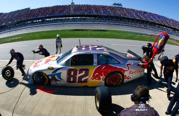 TALLADEGA, AL - OCTOBER 31:  Scott Speed pits the #82 Red Bull Toyota during the NASCAR Sprint Cup Series AMP Energy Juice 500 at Talladega Superspeedway on October 31, 2010 in Talladega, Alabama.  (Photo by Jason Smith/Getty Images for NASCAR)