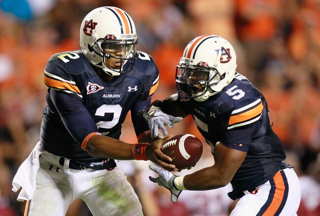 AUBURN, AL - SEPTEMBER 25:  Quarterback Cameron Newton #2 and Michael Dyer #5 of the Auburn Tigers against the South Carolina Gamecocks at Jordan-Hare Stadium on September 25, 2010 in Auburn, Alabama.  (Photo by Kevin C. Cox/Getty Images)