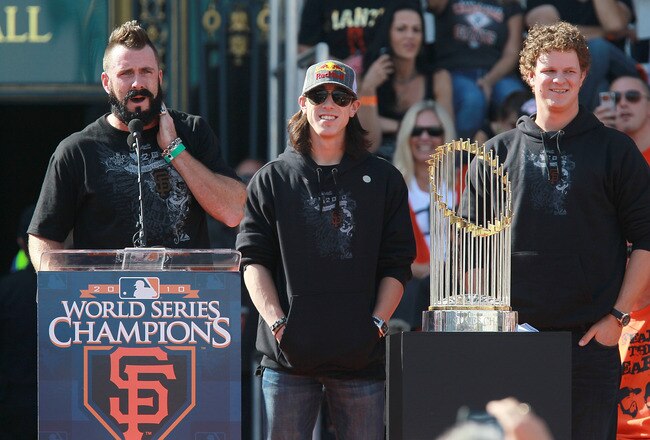 SAN FRANCISCO - NOVEMBER 03:  (L-R) San Francisco Giants pitchers Brian Wilson, Tim Lincecum and Matt Cain speak to fans outside San Francisco city hall during the Giants' victory parade and celebration on November 3, 2010 in San Francisco, California. Th