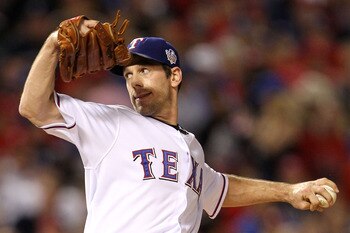 ARLINGTON, TX - NOVEMBER 01:  Cliff Lee #33 of the Texas Rangers pitches against the San Francisco Giants in Game Five of the 2010 MLB World Series at Rangers Ballpark in Arlington on November 1, 2010 in Arlington, Texas.  (Photo by Ronald Martinez/Getty