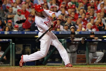 PHILADELPHIA - OCTOBER 23:  Jayson Werth #28 of the Philadelphia Phillies connects for a first inning sacrifice fly against the San Francisco Giants in Game Six of the NLCS during the 2010 MLB Playoffs at Citizens Bank Park on October 23, 2010 in Philadel