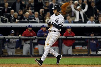 NEW YORK - OCTOBER 19:  Derek Jeter #2 of the New York Yankees celebrates after scoring in the third inning against the Texas Rangers in Game Four of the ALCS during the 2010 MLB Playoffs at Yankee Stadium on October 19, 2010 in the Bronx borough of New Y
