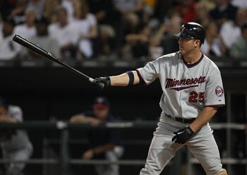 CHICAGO - AUGUST 10: Jim Thome #25 of the Minnesota Twins prepares to bat against the Chicago White Sox at U.S. Cellular Field on August 10, 2010 in Chicago, Illinois. The Twins defeated the White Sox 12-6. (Photo by Jonathan Daniel/Getty Images)