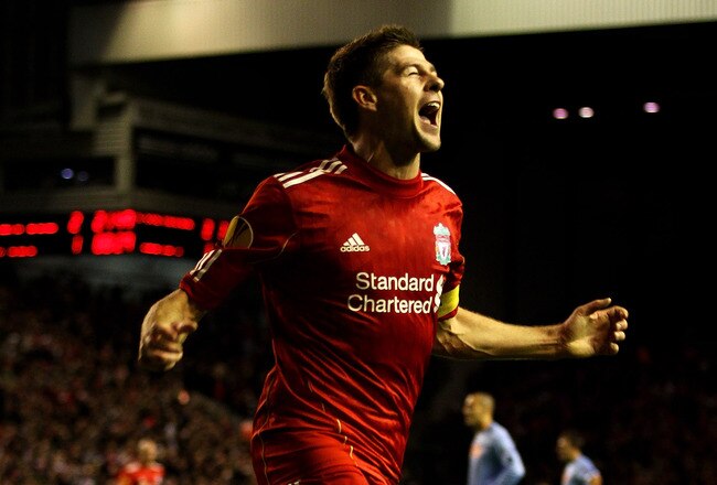 LIVERPOOL, ENGLAND - NOVEMBER 04:  Steven Gerrard of Liverpool celebrates scoring his team's third goal and his hat trick during the UEFA Europa League Group K match beteween Liverpool and SSC Napoli at Anfield on November 4, 2010 in Liverpool, England.
