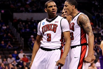 OKLAHOMA CITY - MARCH 18:  (L-R) Anthony Marshall #3, Steve Jones #20 and Tre'Von Willis #33 of the UNLV Rebels reacts after Marshall dunked against the Northern Iowa Panthers during the first round of the 2010 NCAA men's basketball tournament at Ford Cen