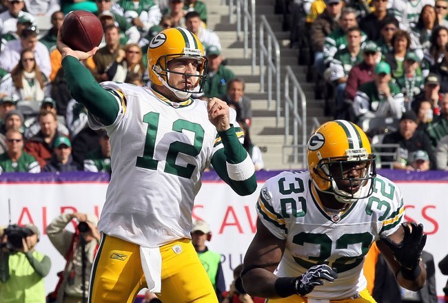 EAST RUTHERFORD, NJ - OCTOBER 31:  Aaron Rodgers #12 of the Green Bay Packers throws a pass against the New York Jets on October 31, 2010 at the New Meadowlands Stadium in East Rutherford, New Jersey.The Packers defeated the Jets 9-0.  (Photo by Jim McIsa