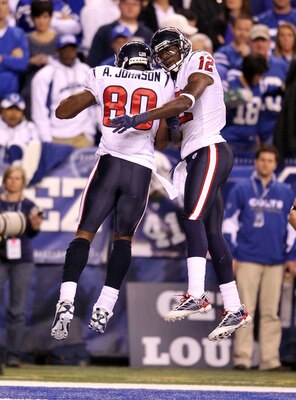 INDIANAPOLIS - NOVEMBER 01:  Andre Johnson #80 of Houston Texans celebrates with Jacoby Jones #12 after Johnson caught a touchdown pass during the NFL game against the Indianapolis Colts at Lucas Oil Stadium on November 1, 2010 in Indianapolis, Indiana.