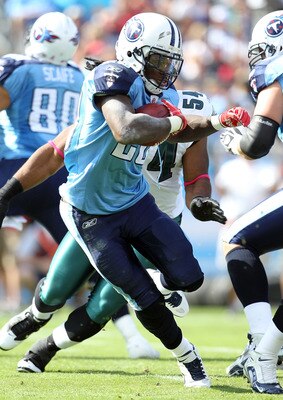 NASHVILLE, TN - OCTOBER 24:  Chris Johnson #28 of the Tennessee Titans runs with the ball during the NFL game against the Philadelphia Eagles at LP Field on October 24, 2010 in Nashville, Tennessee. The Titans won 37-19.  (Photo by Andy Lyons/Getty Images