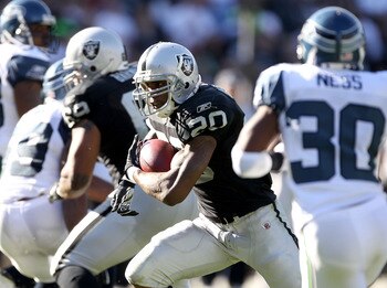 OAKLAND, CA - OCTOBER 31:  Darren McFadden #20 of the Oakland Raiders runs with the ball against the Seattle Seahawks at Oakland-Alameda County Coliseum on October 31, 2010 in Oakland, California.  (Photo by Ezra Shaw/Getty Images)