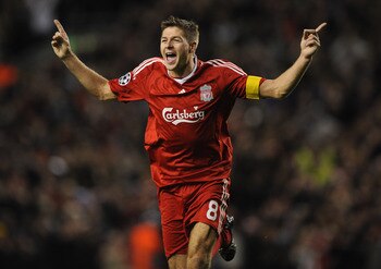 LIVERPOOL, UNITED KINGDOM - OCTOBER 01:  Steven Gerrard of Liverpool celebrates scoring his team's third goal, and his 100th goal for Liverpool during the UEFA Champions League Group D match between Liverpool and PSV Eindhoven at Anfield on October 1, 200