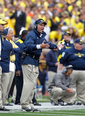 ANN ARBOR, MI - SEPTEMBER 25: Michigan Head Coach Rich Rodriguez reacts to a play during the second quarter of the game against Bowling Green on September 25, 2010 at Michigan Stadium in Ann Arbor, Michigan. Michigan defeated Bowling Green 65-21.  (Photo