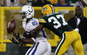 GREEN BAY, WI - AUGUST 26: Sam Shields #37 of the Green Bay Packers breaks up a pass intended for Pierre Garcon # 85 of the Indianapolis Colts during a preseason game at Lambeau Field on August 26, 2010 in Green Bay, Wisconsin. The Packers defeated the Co