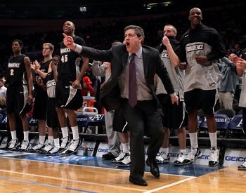 NEW YORK - MARCH 09:  Head coach Keno Davis of the Providence Friars reacts from the bench against the Seton Hall Pirates during the first round game of the Big East Basketball Tournament at Madison Square Garden on March 9, 2010 in New York, New York.  (