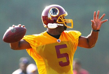 ASHBURN, VA - AUGUST 06:  Quarterback Donovan McNabb #5 of the Washington Redskins takes part in drills during Redskins training camp on August 6, 2010 in Ashburn, Virginia.  (Photo by Win McNamee/Getty Images)