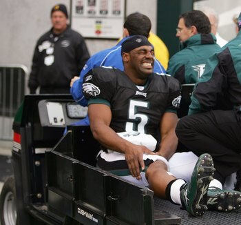PHILADELPHIA - NOVEMBER 19: Donovan McNabb #5 of the Philadelphia Eagles is carted off the field after injuring his right knee in the second quarter against the Tennessee Titans on November 19, 2006 at Lincoln Financial Field in Philadelphia, Pennsylvania