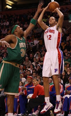 BOSTON - MARCH 15:  Tayshaun Prince #22 of the Detroit Pistons takes a shot as Paul Pierce #34 of the Boston Celtics defends on March 15, 2010 at the TD Garden in Boston, Massachusetts.  NOTE TO USER: User expressly acknowledges and agrees that, by downlo