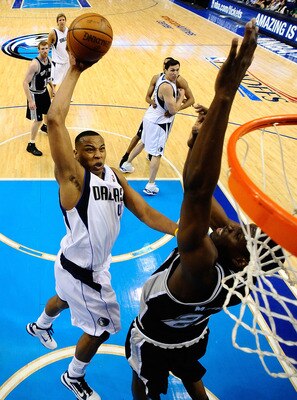DALLAS - APRIL 27:  Forward Caron Butler #4 of the Dallas Mavericks takes a shot against Ian Mahinmi #28 of the San Antonio Spurs in Game Five of the Western Conference Quarterfinals during the 2010 NBA Playoffs at American Airlines Center on April 27, 20