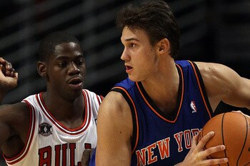 CHICAGO - NOVEMBER 04: Danilo Gallinari #8 of the New York Knicks looks to pass under pressure from Ronnie Brewer #11 of the Chicago Bulls at the United Center on November 4, 2010 in Chicago, Illinois. The Knicks defeated the Bulls 120-112. NOTE TO USER: